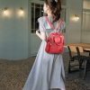 H0c988f0968f84001ad12779b3e1498f6v_e9b65582-c297-4f69-be39-7767f8988a67.jpg Sac à dos rouge en simili cuir avec grain femme