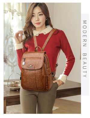 H352f72497a7e4f0fb7ab2344497fdde0c_f0ac2952-55c9-4c71-98cf-4150d0651267.jpg Sac à dos simili cuir marron pour femme