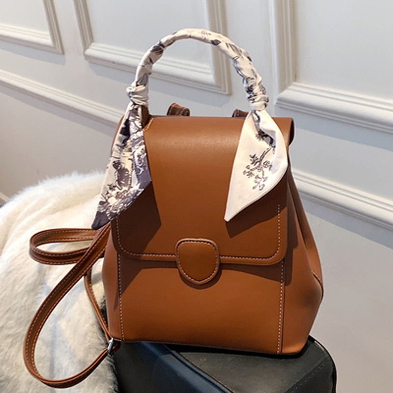 Sac à dos femme en simili cuir à bandoulière et bretelle