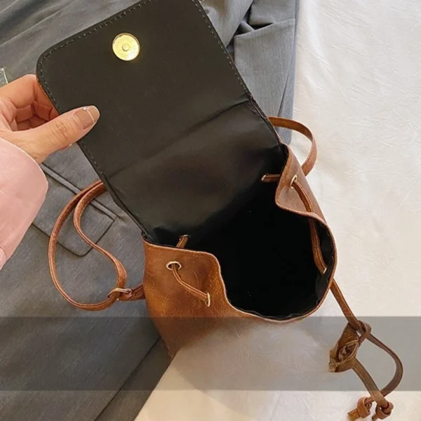 S10078b0b9ac84741a84121b917ac808f0.webp Sac à dos de luxe style vintage marron