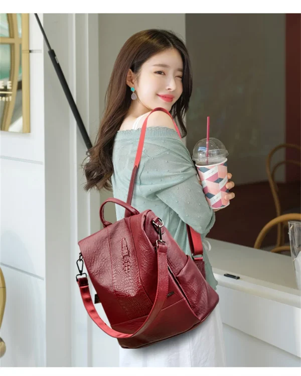 S207c63485b9e4b0091ad2684a29c55c85.webp Sac à dos pour femme en cuir effet croco