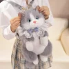 S84b1d84a577a462e90a7081700d8cfa3M.webp Sac à dos pour enfant en forme de chat ultra-réaliste