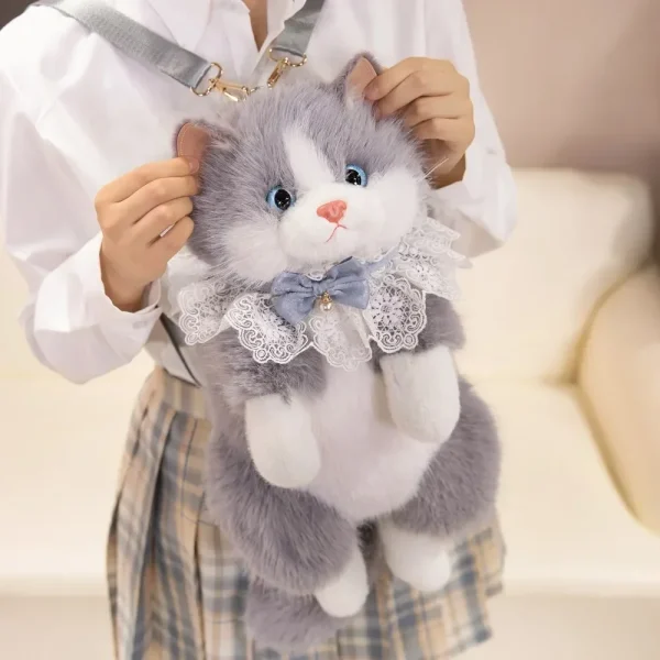 S84b1d84a577a462e90a7081700d8cfa3M.webp Sac à dos pour enfant en forme de chat ultra-réaliste