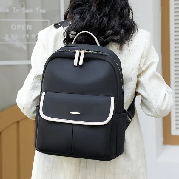 S8b1c8b61b96c4961a7cb133e774d21e3o.webp Sac à dos en nylon grande capacité pour femme
