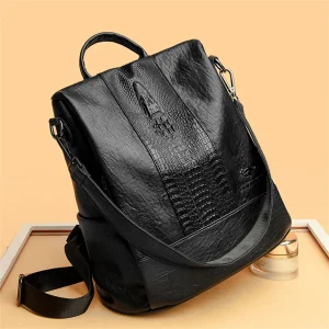 Sc0124ca2eb7d43e9878cbba09fb1c48bm.webp Sac à dos pour femme en cuir effet croco
