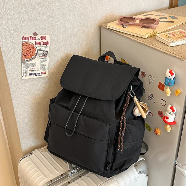 Se1774e71d0b24cb8a8e5b35794ca06ba4.webp Sac à dos décontracté à cordon en nylon imperméable