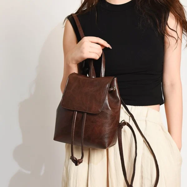 Sf8b2c465abce45f2b01448c04a4ec9c0C.webp Sac à dos de luxe style vintage marron