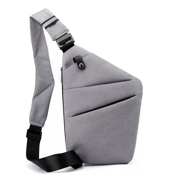 sac_bandouliere_antivol_gris_epaule_gauche.jpg Sac Bandoulière Antivol - Secure™