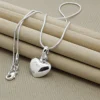 Collier avec pendentif cœur plein argenté