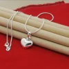 Collier avec pendentif cœur plein argenté